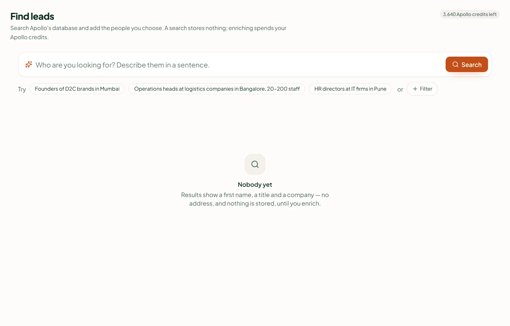 Linkubit Find leads: a one-sentence search box with example searches, filters and the Apollo credits left